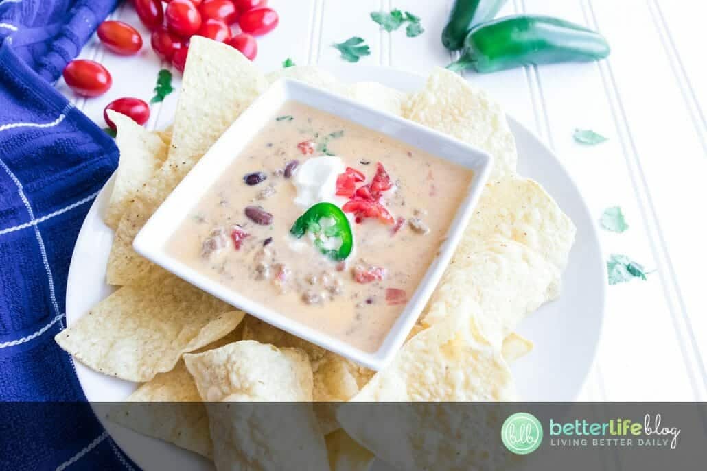 This Beer Cheese Queso Dip is one for the books! Serve it with your favorite nachos and you’ve got a summer appetizer your guests will constantly talk about (and request!) #quesodip