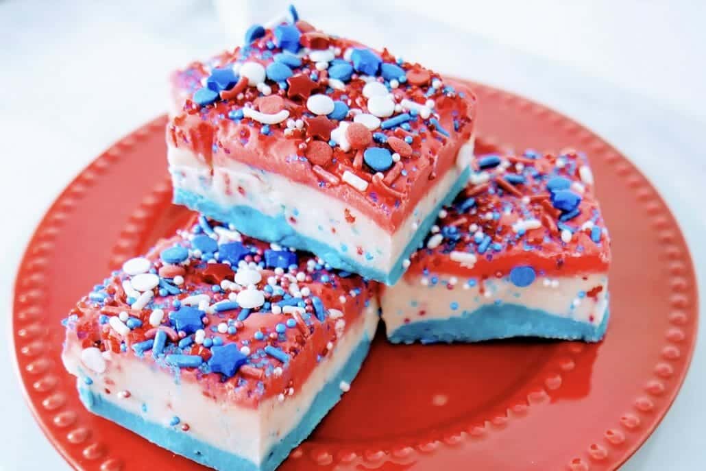 This Red, White and Blue Fudge is the perfect dessert to serve for your Fourth of July festivities! Wow your guests with the layers of color and generous amount of patriotic sprinkles. The best dessert for your favorite American holiday!