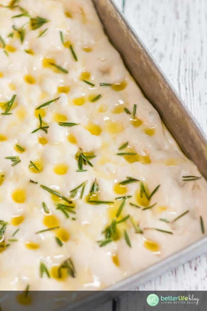 This Focaccia Bread Recipe is simple and easy! Infused with fresh rosemary and quality olive oil, this focaccia bread is gorgeous and tasty!