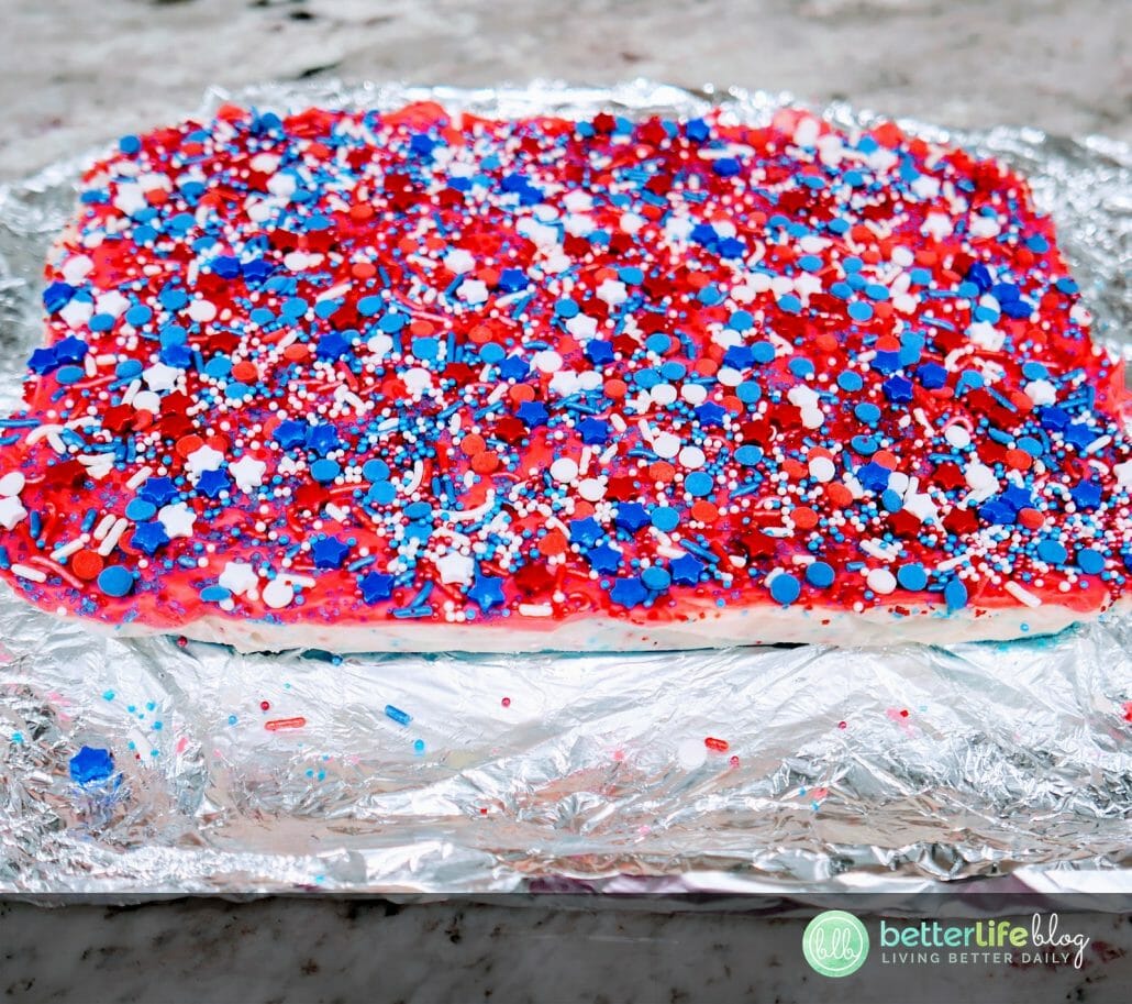 This Red, White and Blue Fudge is the perfect dessert to serve for your Fourth of July festivities! Wow your guests with the layers of color and generous amount of patriotic sprinkles. The best dessert for your favorite American holiday!