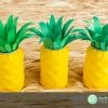 This Cricut craft is perfect for any Hawaiian-themed party. Learn how to make this Pineapple Soda Can decoration with cardstock and leftover soda cans.