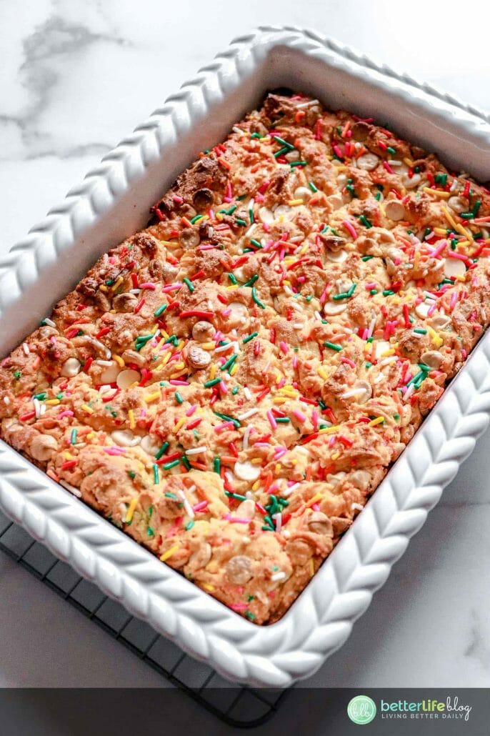 My Easy Cake Batter Blondies are a breeze to whip-up and you’ll be impressed by the sweet results! These blondies are garnished with a hefty amount of sprinkles and white chocolate chips. There’s deliciousness in every single bite and you’ll want to make a batch for your family - stat!