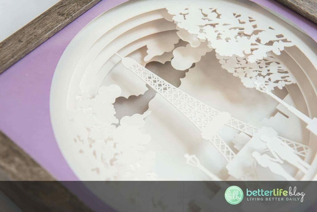 Paris, je t’aime! This beautiful Cricut Paris Shadowbox boasts a gorgeous, intricate design, backed with a glowing LED light. Check out our easy tutorial to learn how to make one of your own.