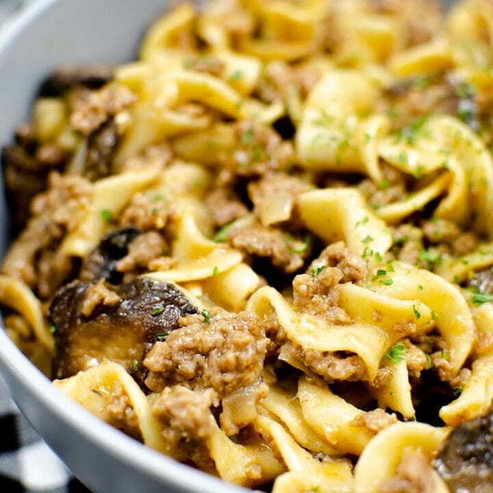 Tender beef with creamy mushrooms and onions - this Instant Pot Beef Stroganoff is full of flavor and absolute perfection! Check out my recipe to learn how to make this dish for your family tonight!