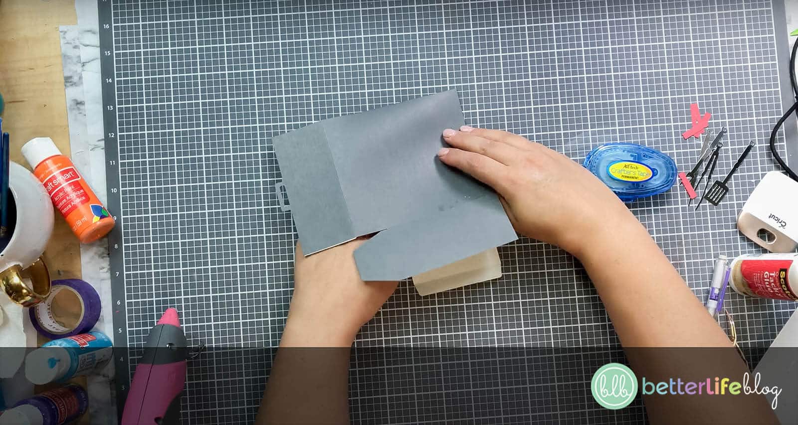 Folding over a large piece of black cardstock