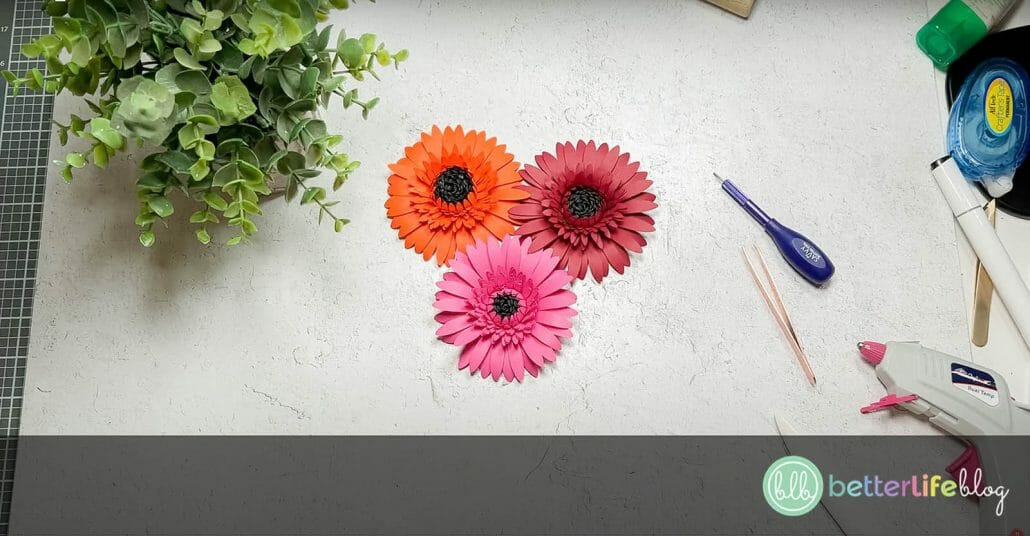 Making paper flowers with a Cricut machine is as easy as 1-2-3. Take a look at my blog post for full step-by-step instructions so that you can create your very own Paper Gerbera Daisies.