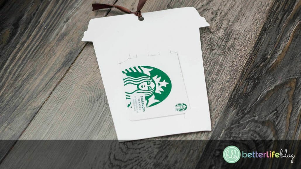 A Starbucks gift card inserted into a coffee gift card holder made from a Cricut machine