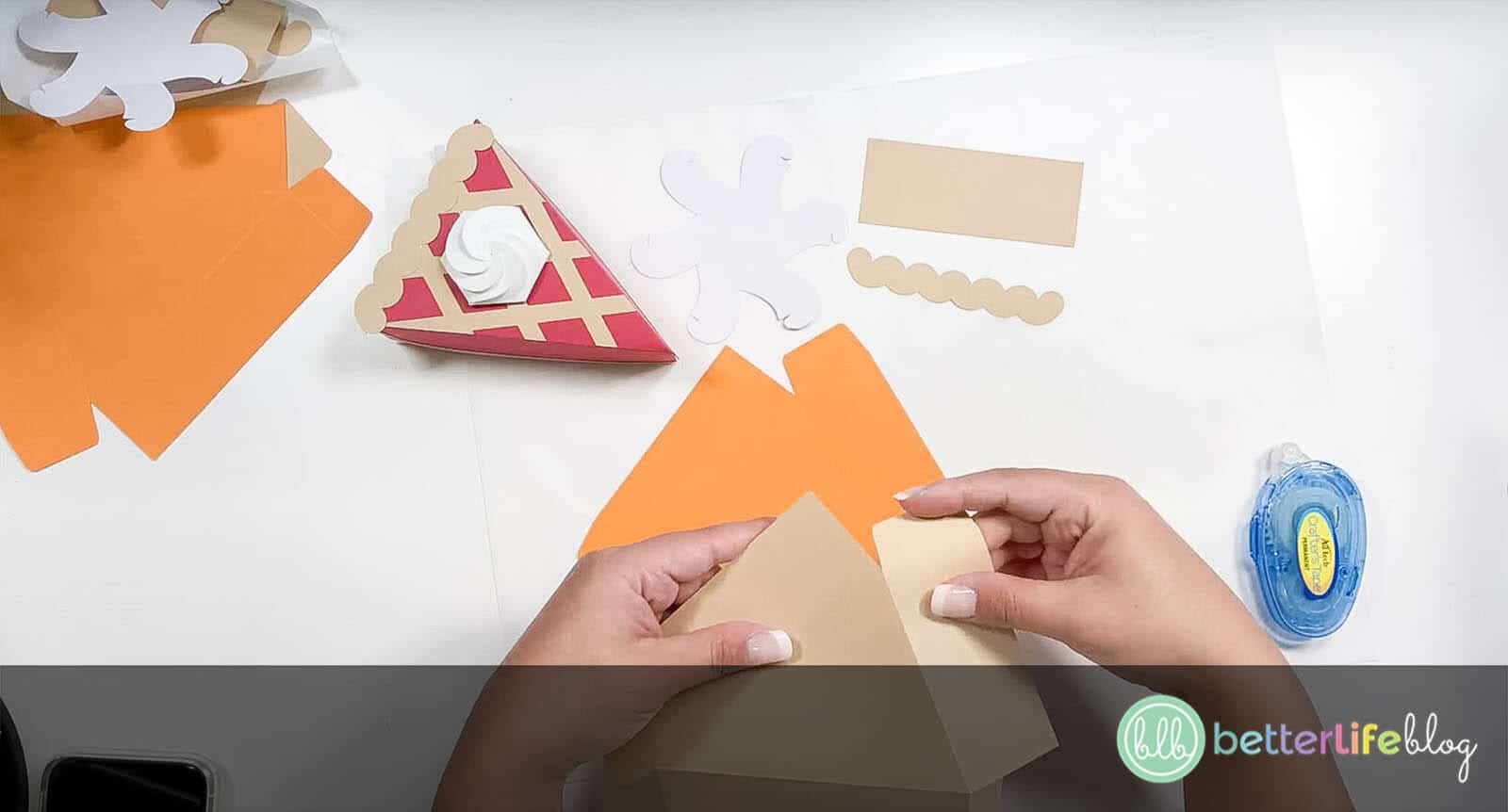 Folding the edges of brown cardstock cut in the shape of a pie slice to make a pie slice box