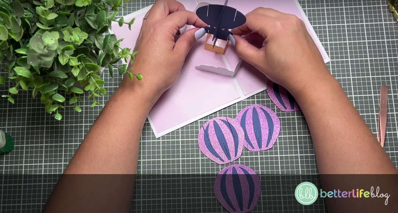 Inserting a 3D hot air balloon made of cardstock in the center of a Cricut pop-up card