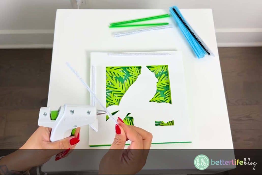 Looking for unique holiday Cricut projects? This Cardinal Shadow Box is the perfect DIY craft for Christmas! Layered cardstock, a little glue, and an SVG file bring this 3D festive design to life. Add it to your holiday décor or gift it to a loved one!
